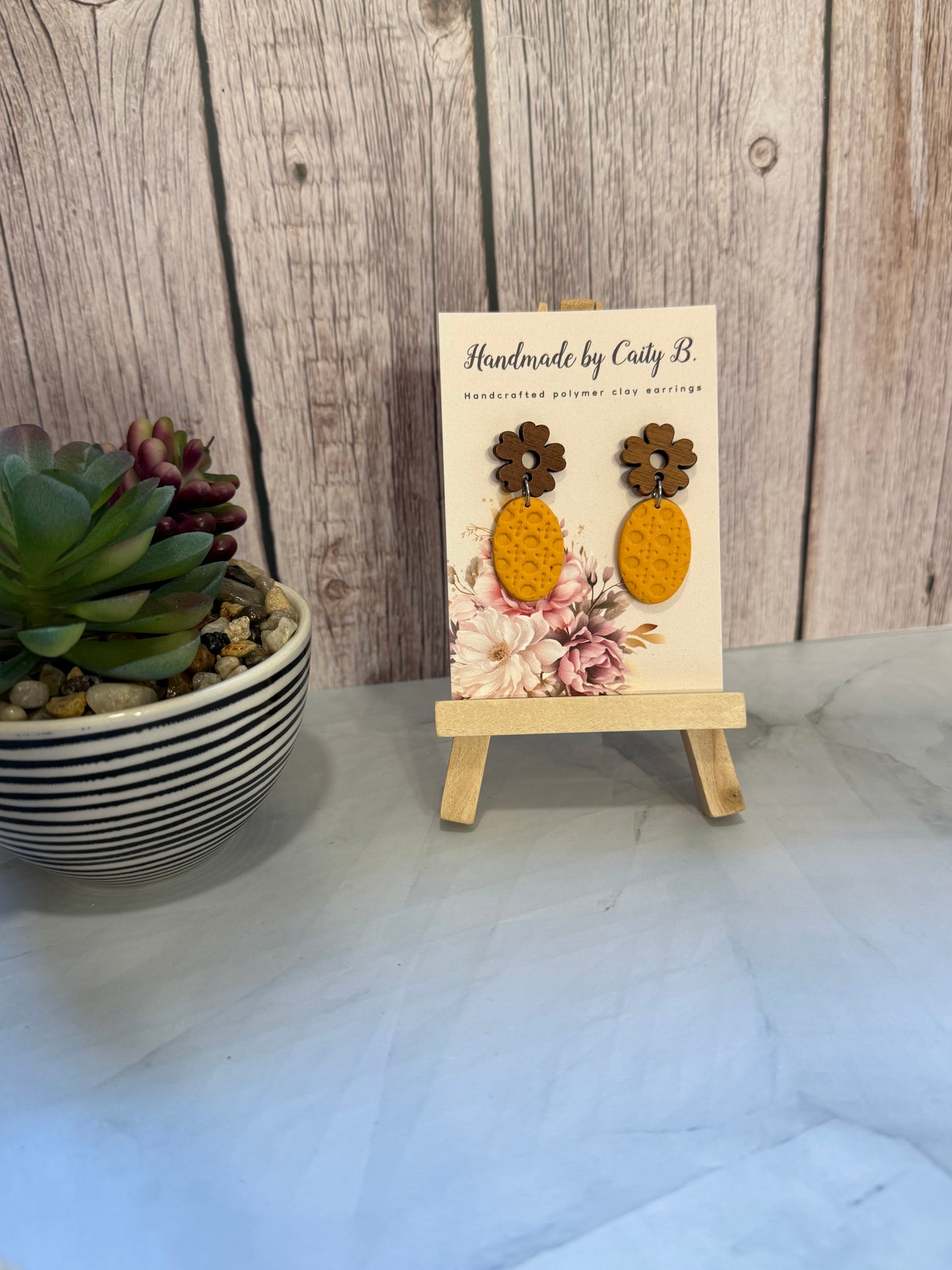 Oval Rattan Pattern Dangles with Wooden Flower Top