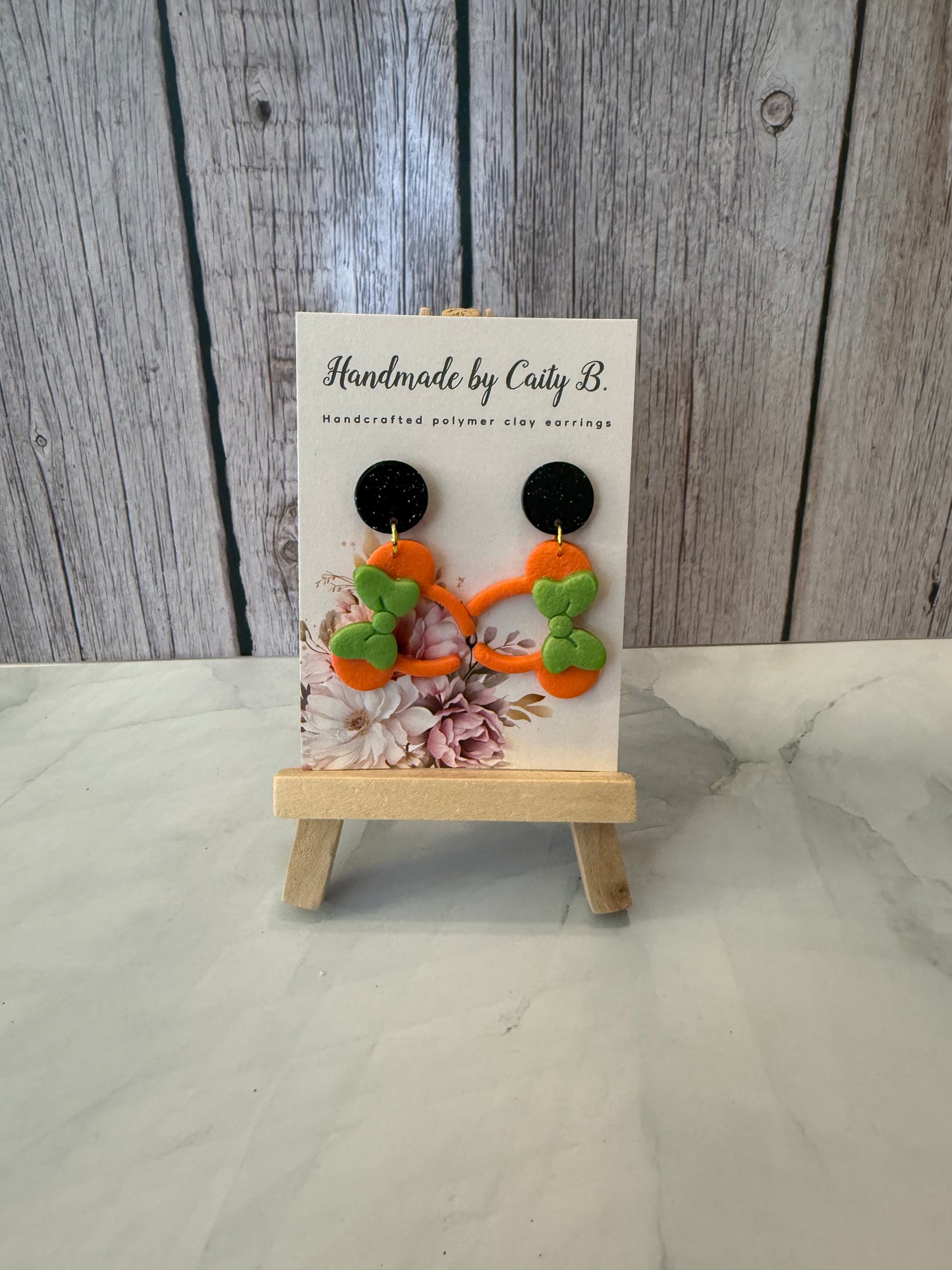 mouse inspired ears- orange with green bows
