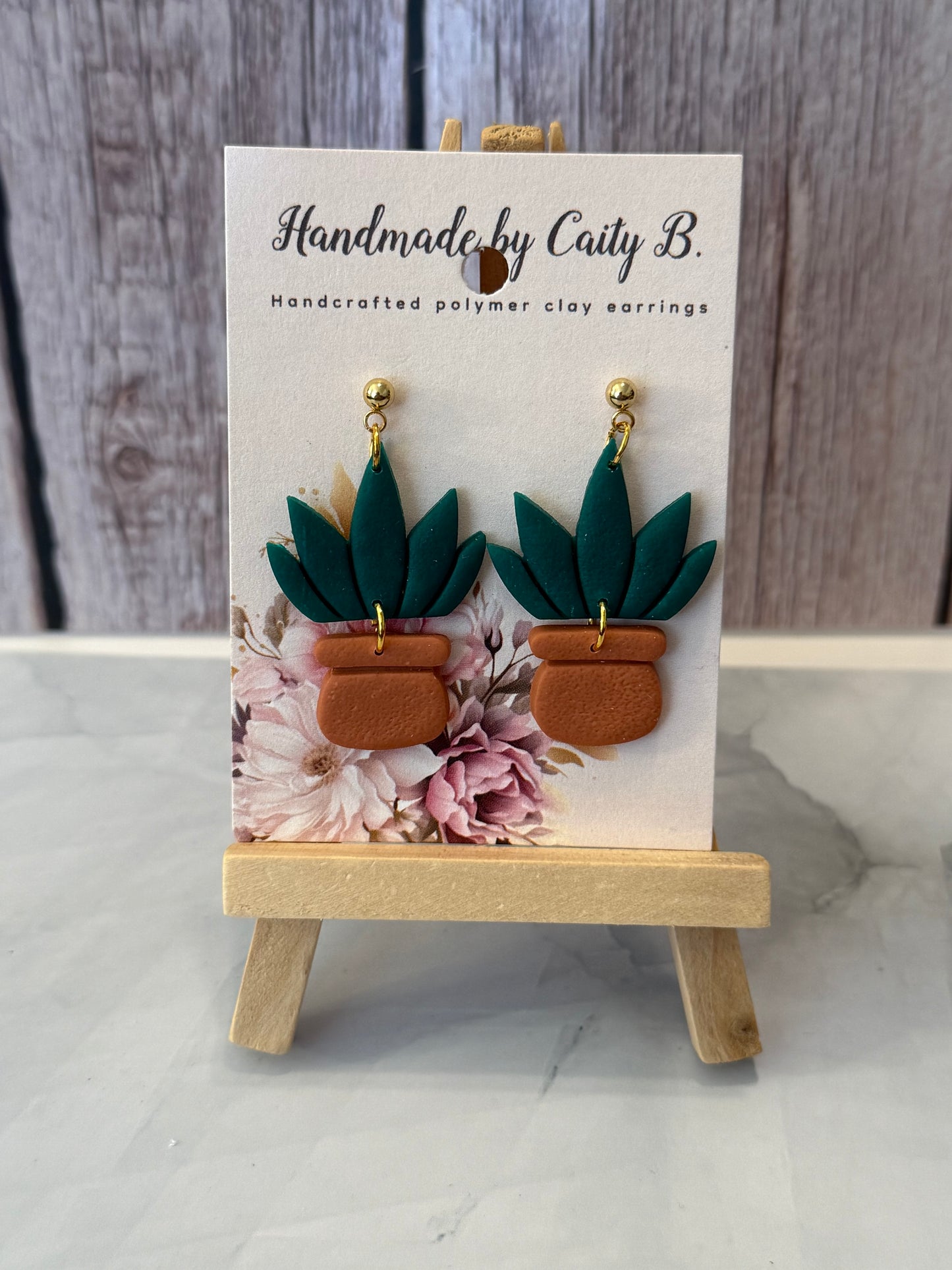 plant dangles with gold tops