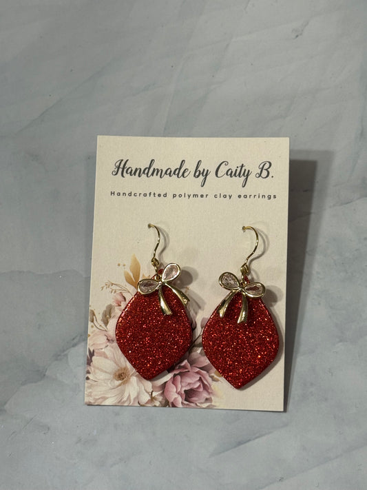 glitter red drop dangles with bow charm