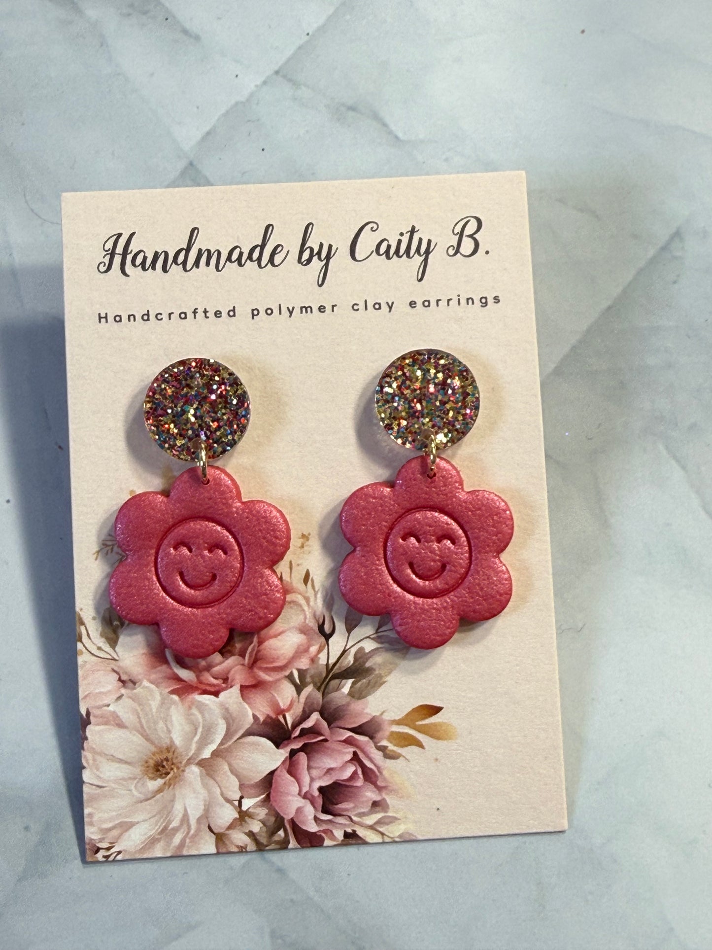 Smiley face flowers with confetti tops