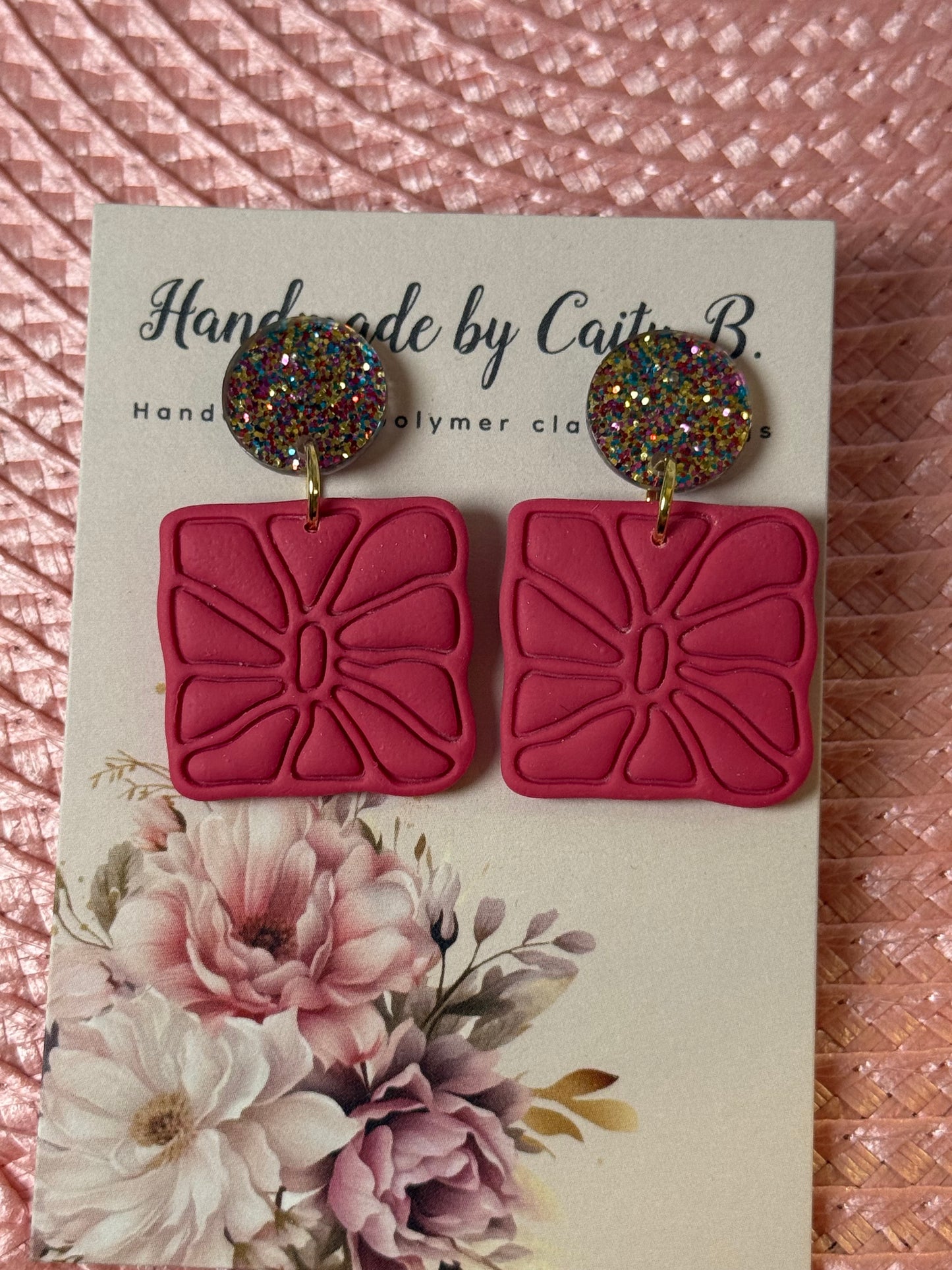 pink earrings with confetti tops