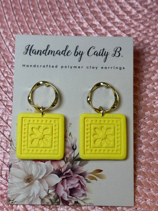 yellow square earrings with gold circle tops