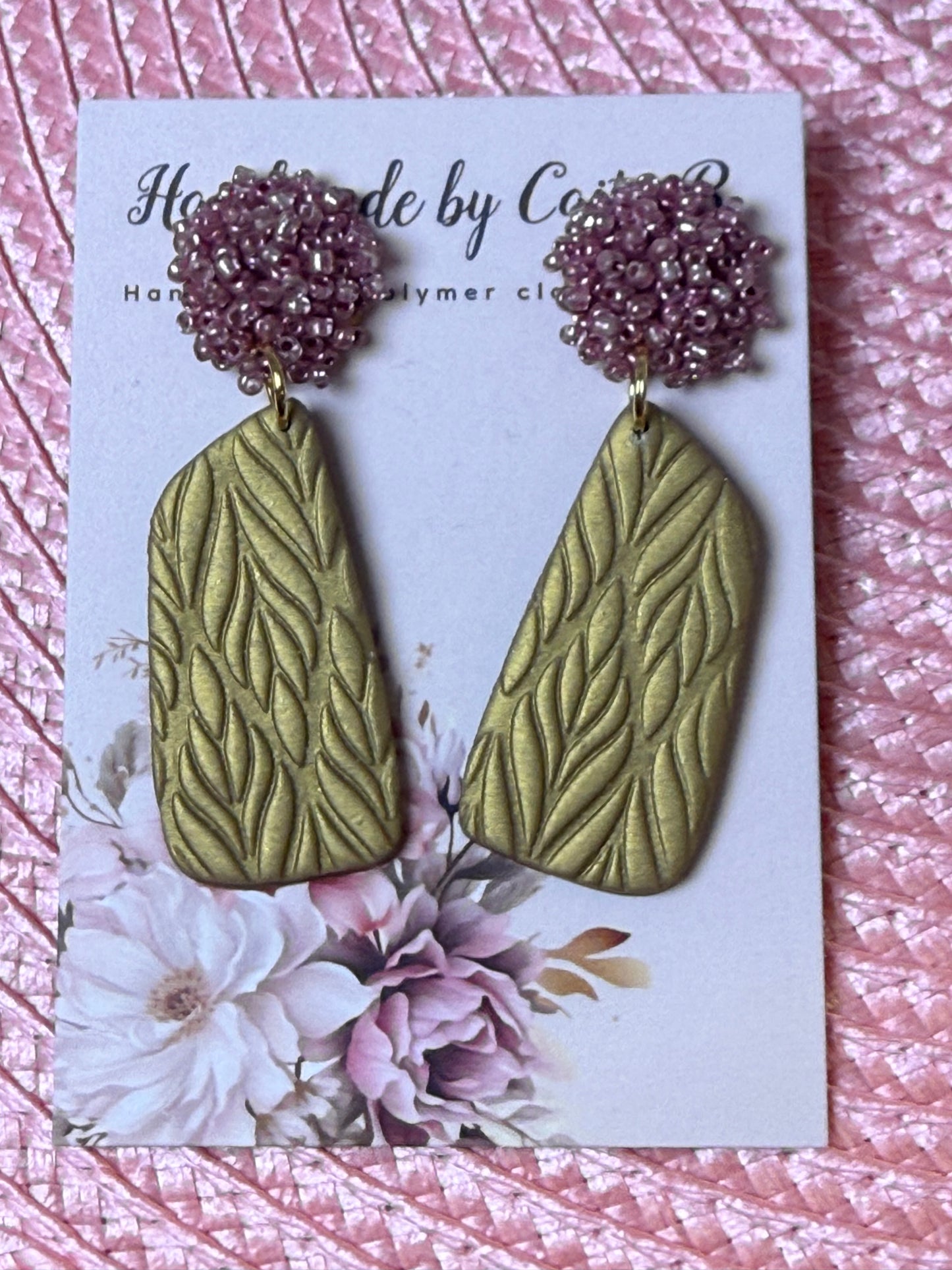 gold drop earrings with pink beaded tops