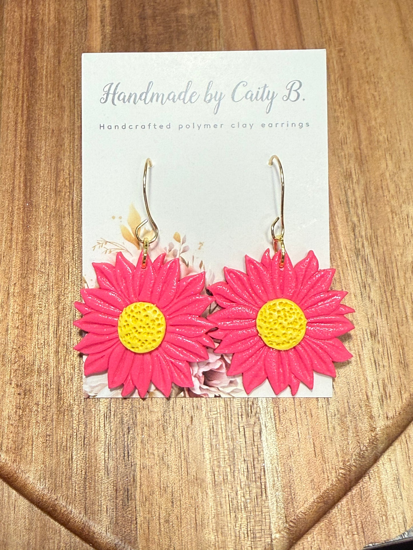 Pink flowers with gold dangles