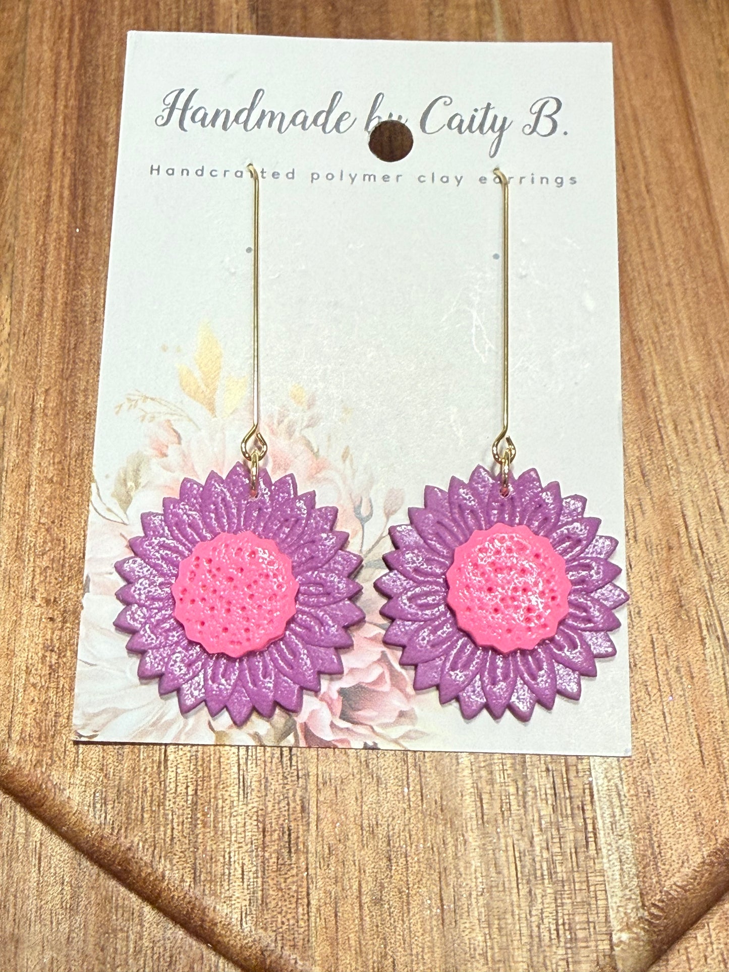purple and pink drop daisy gold flowers