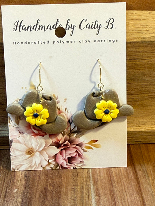 Cowboy hats with yellow flowers