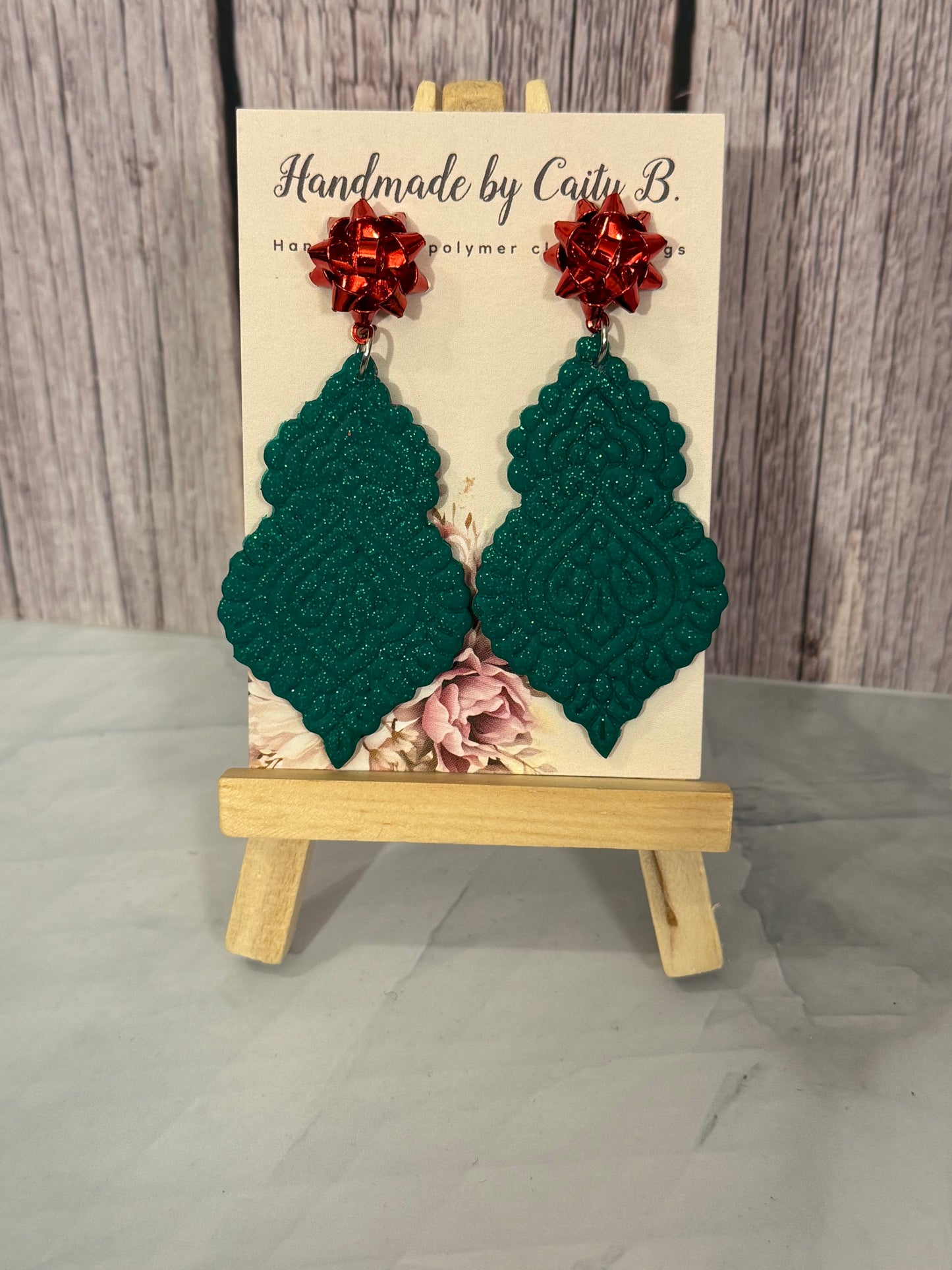 holiday sparkle with red bow tops