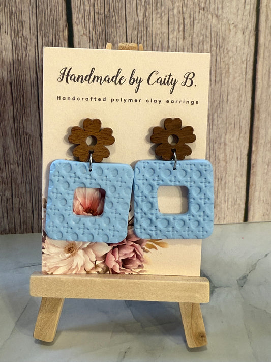 square rattan pattern earrings with wooden flower tops