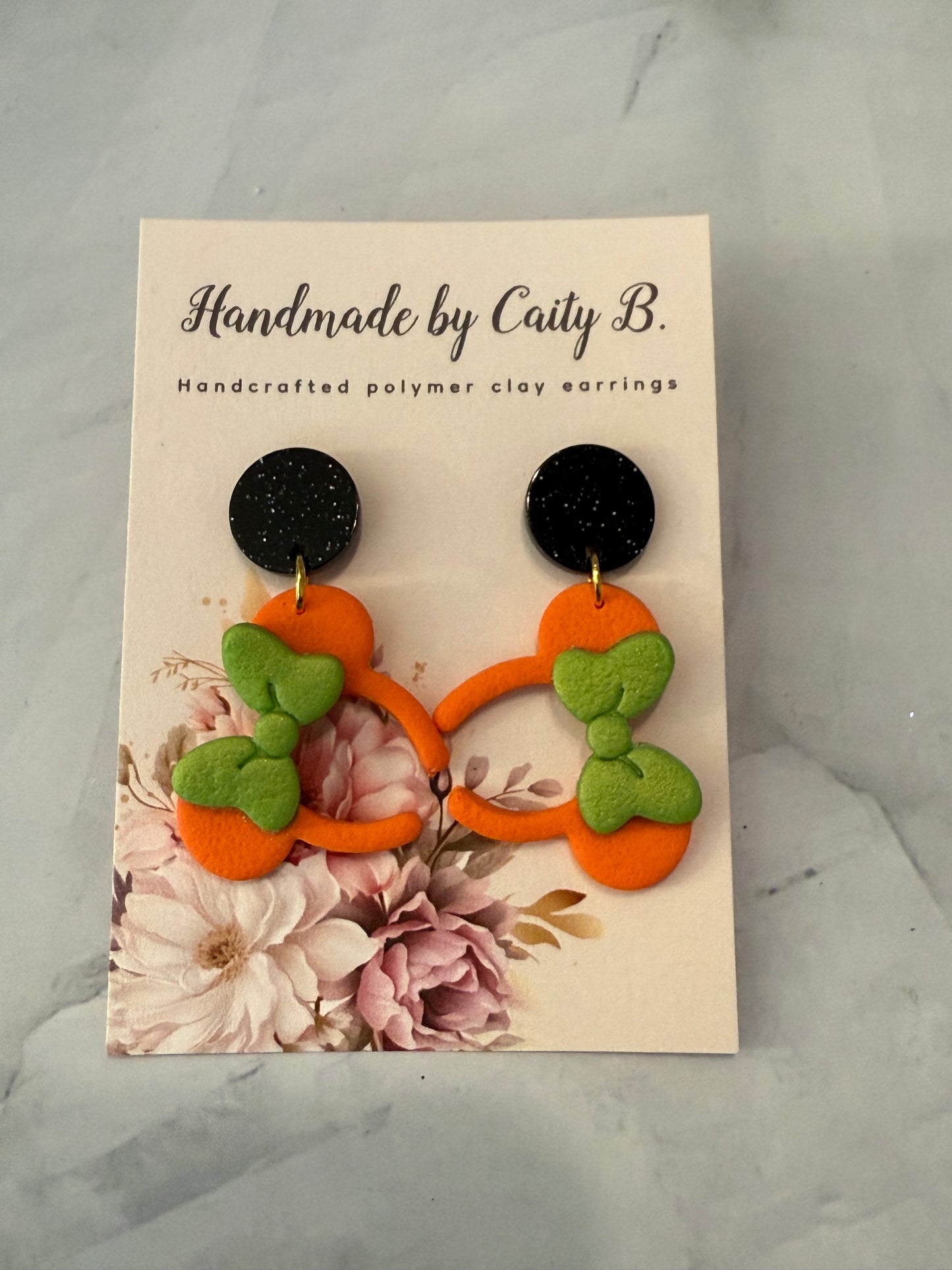 mouse inspired ears- orange with green bows