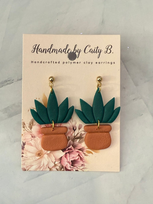 plant dangles with gold tops