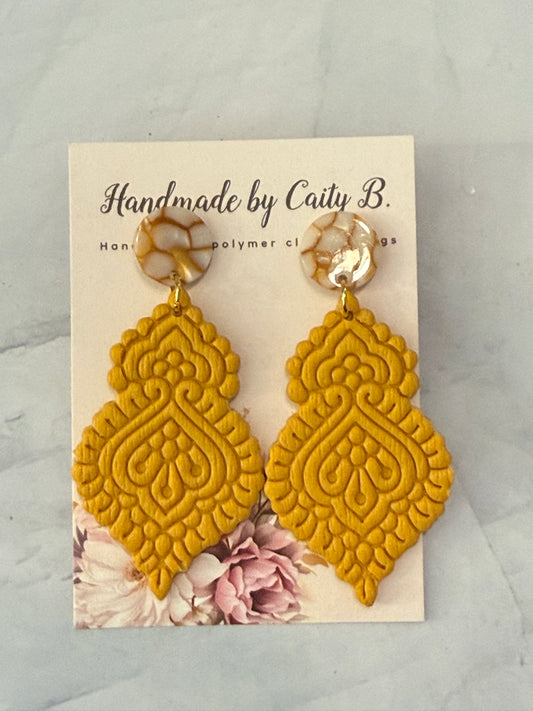 golden dangles with circle tops