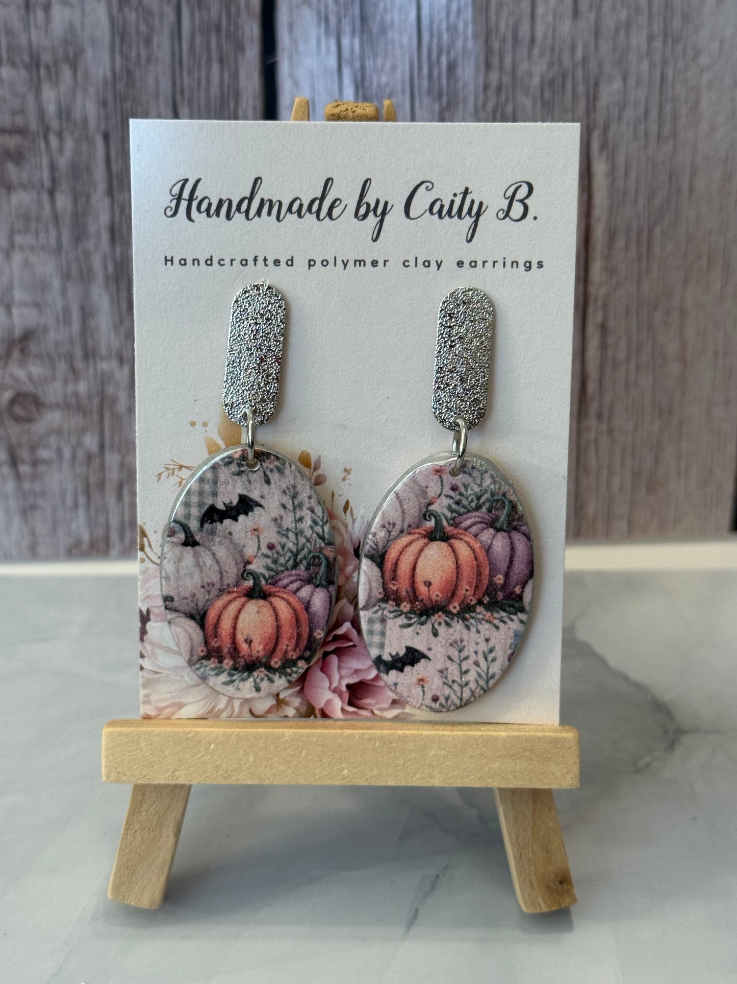 oval pumpkin dangles with silver tops