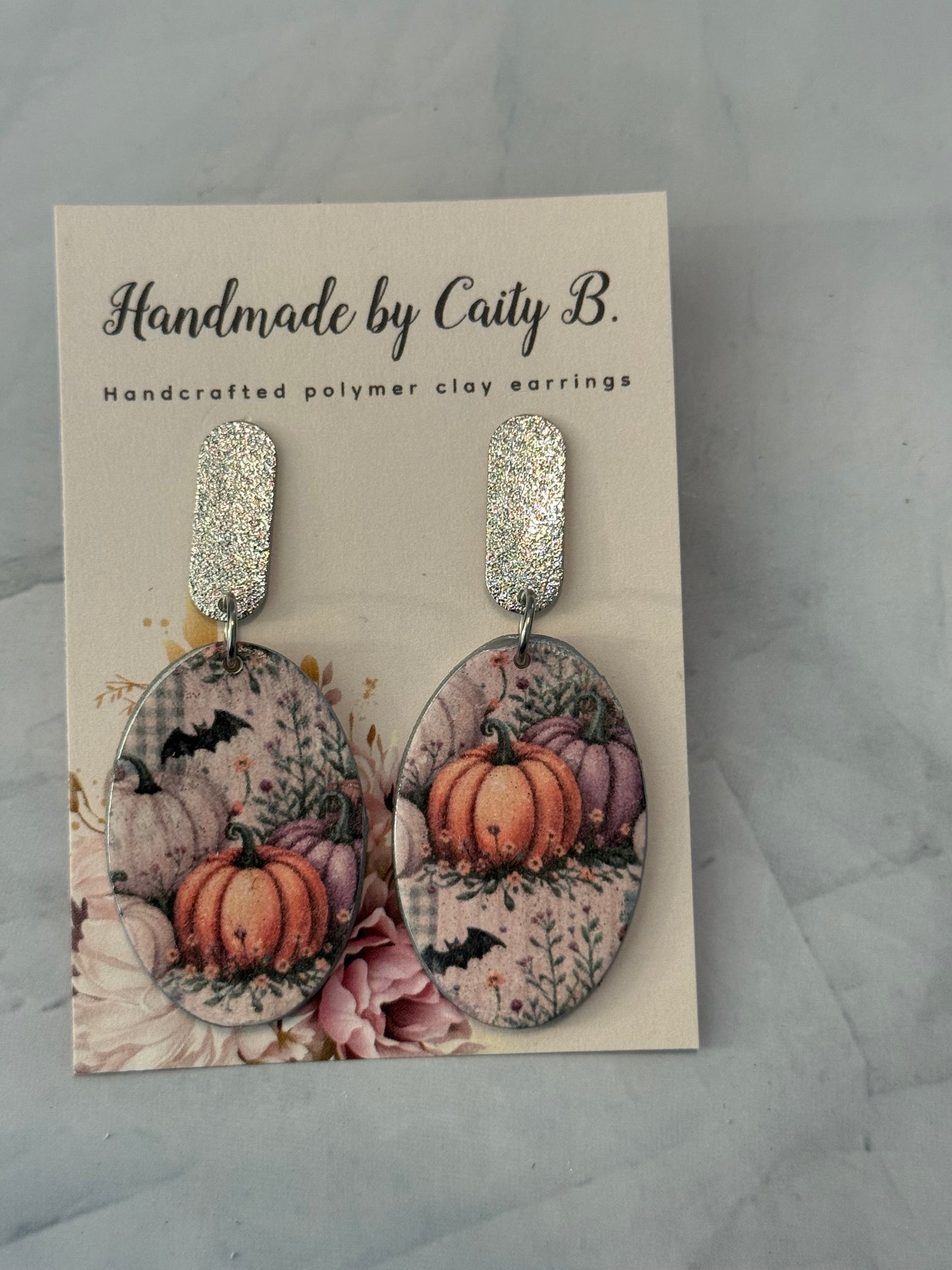 oval pumpkin dangles with silver tops