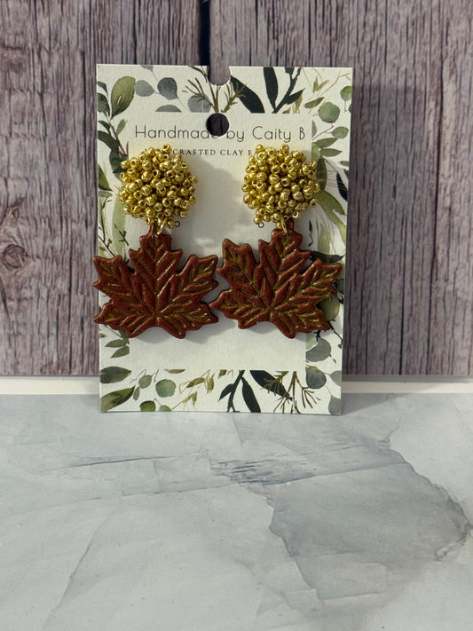 leaves with gold beaded top