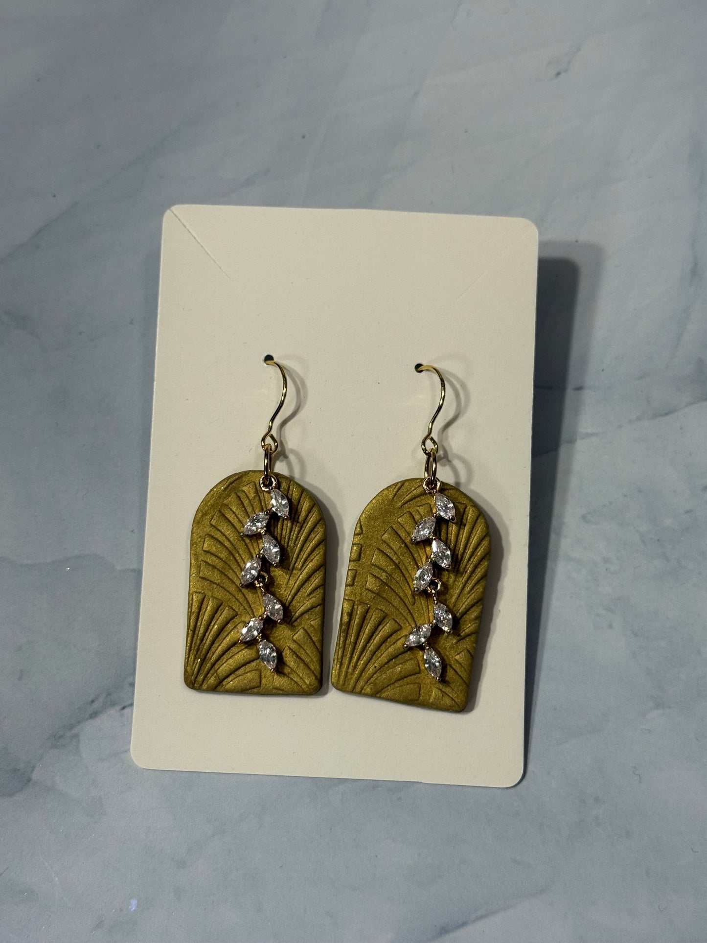 gold arches with rhinestone charm