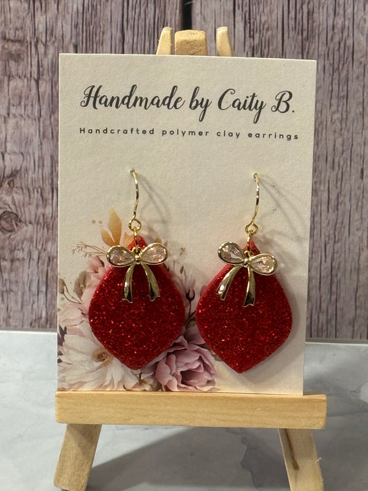 glitter red drop dangles with bow charm