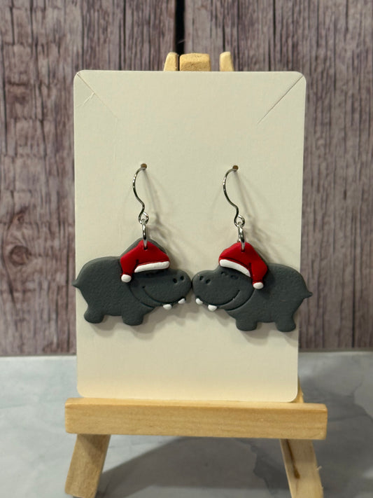 hippopotamus with Santa hats
