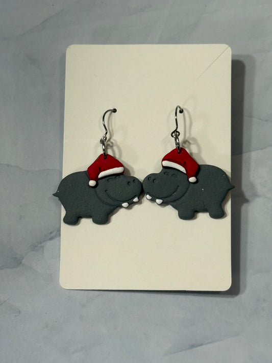 hippopotamus with Santa hats