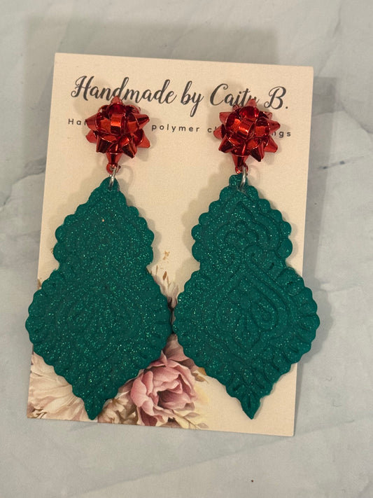 holiday sparkle with red bow tops