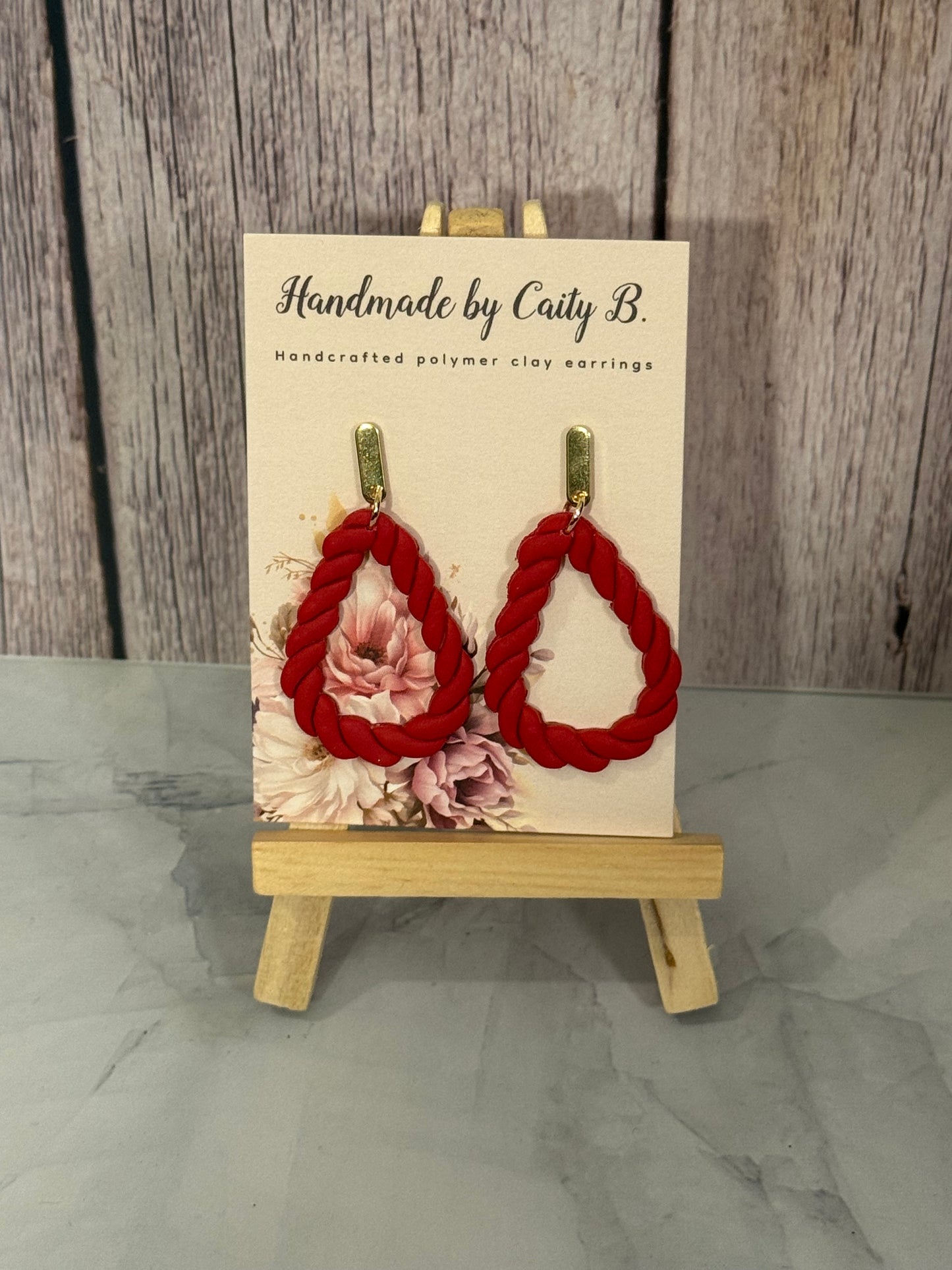 Red Dangles with Gold Bar Tops