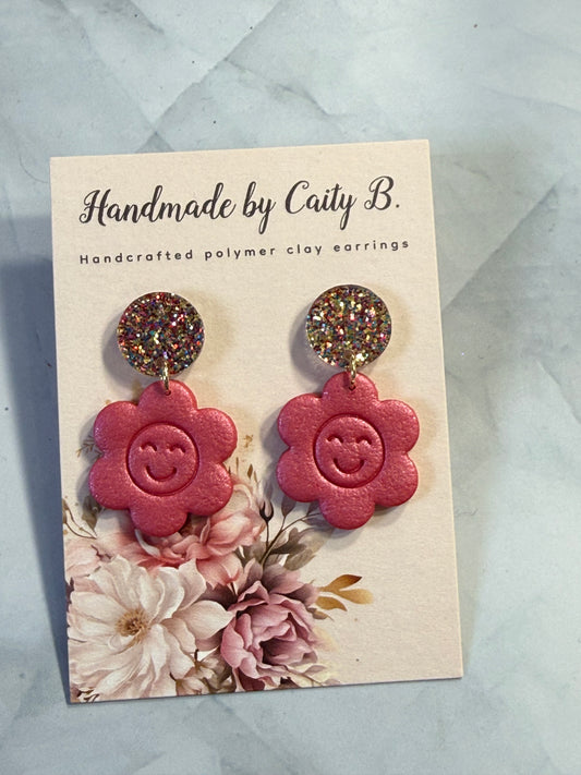 Smiley face flowers with confetti tops