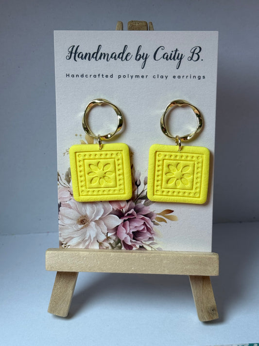 yellow square earrings with gold circle tops