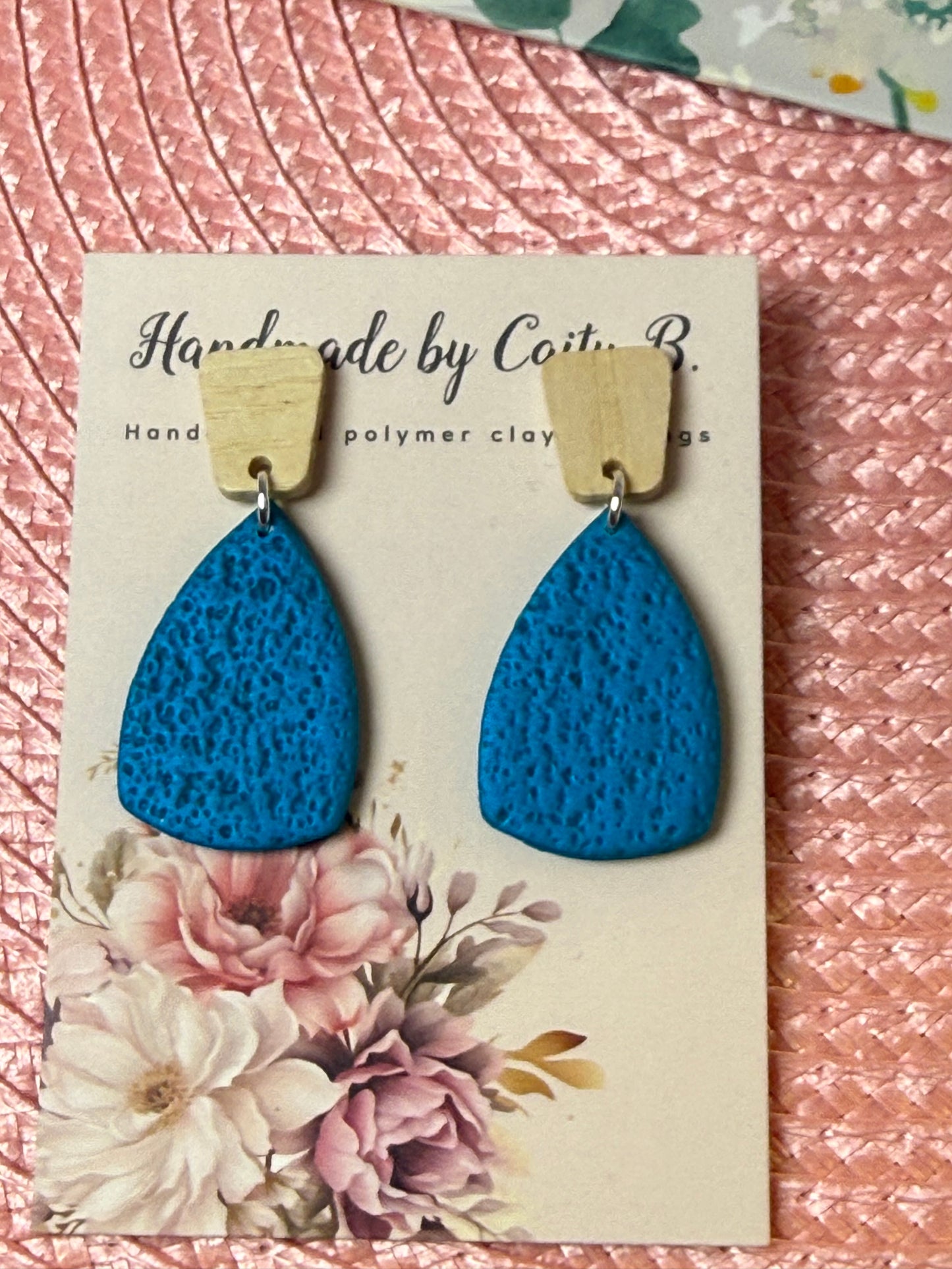 blue textured earrings with wooden tops