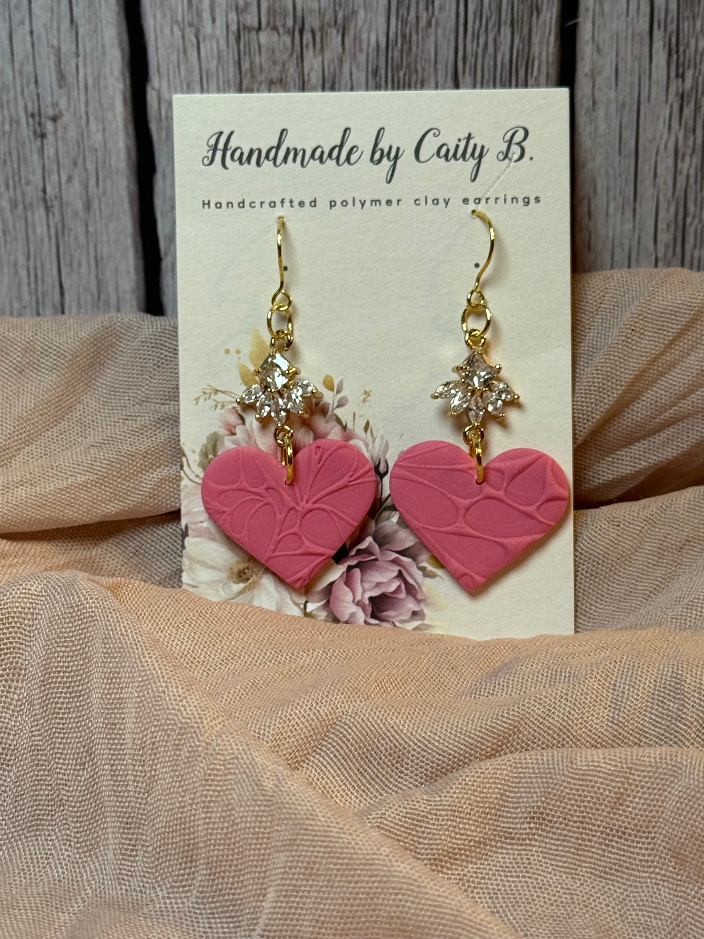 pink heart dangles with rhinestone charm
