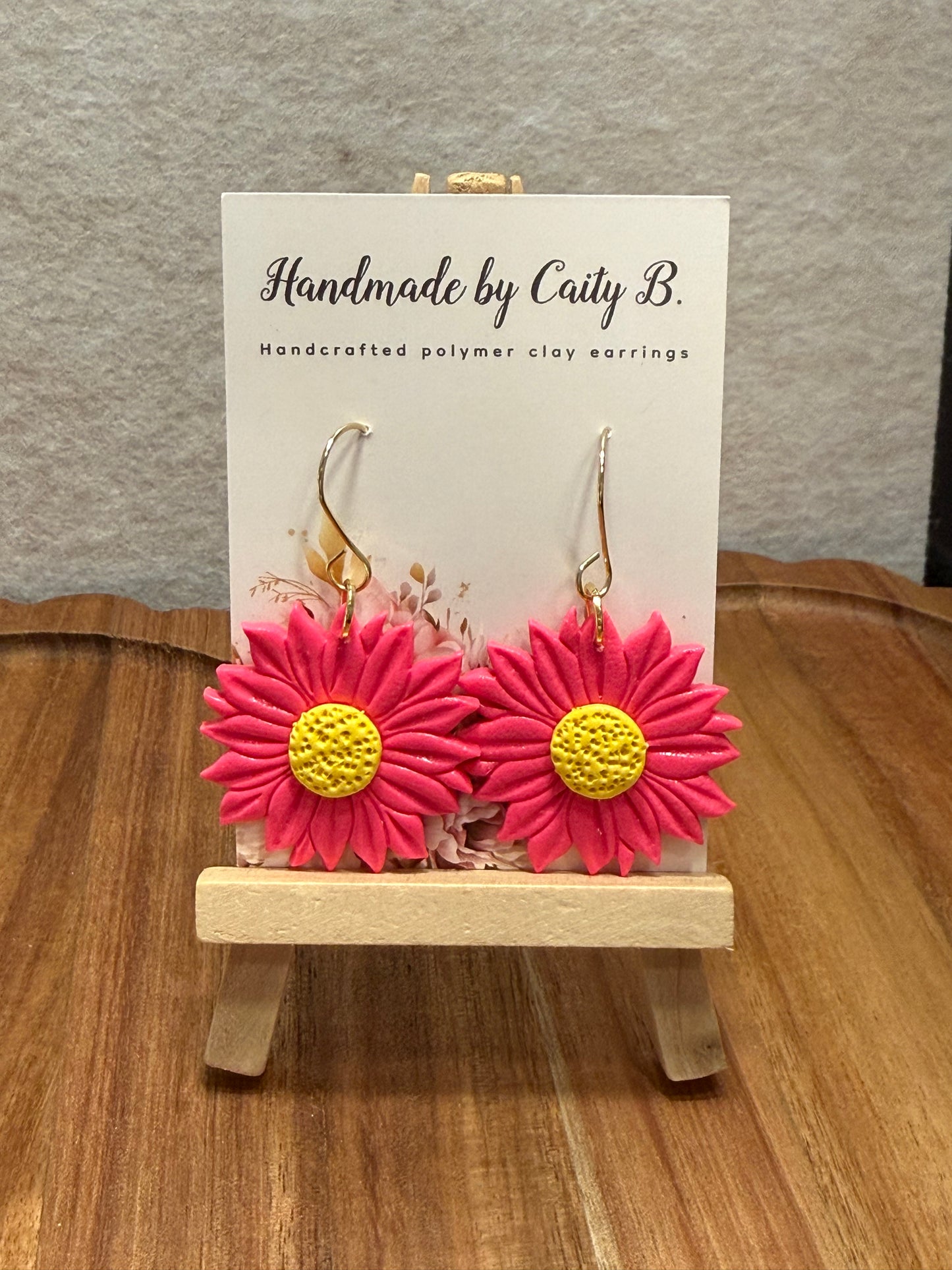 Pink flowers with gold dangles