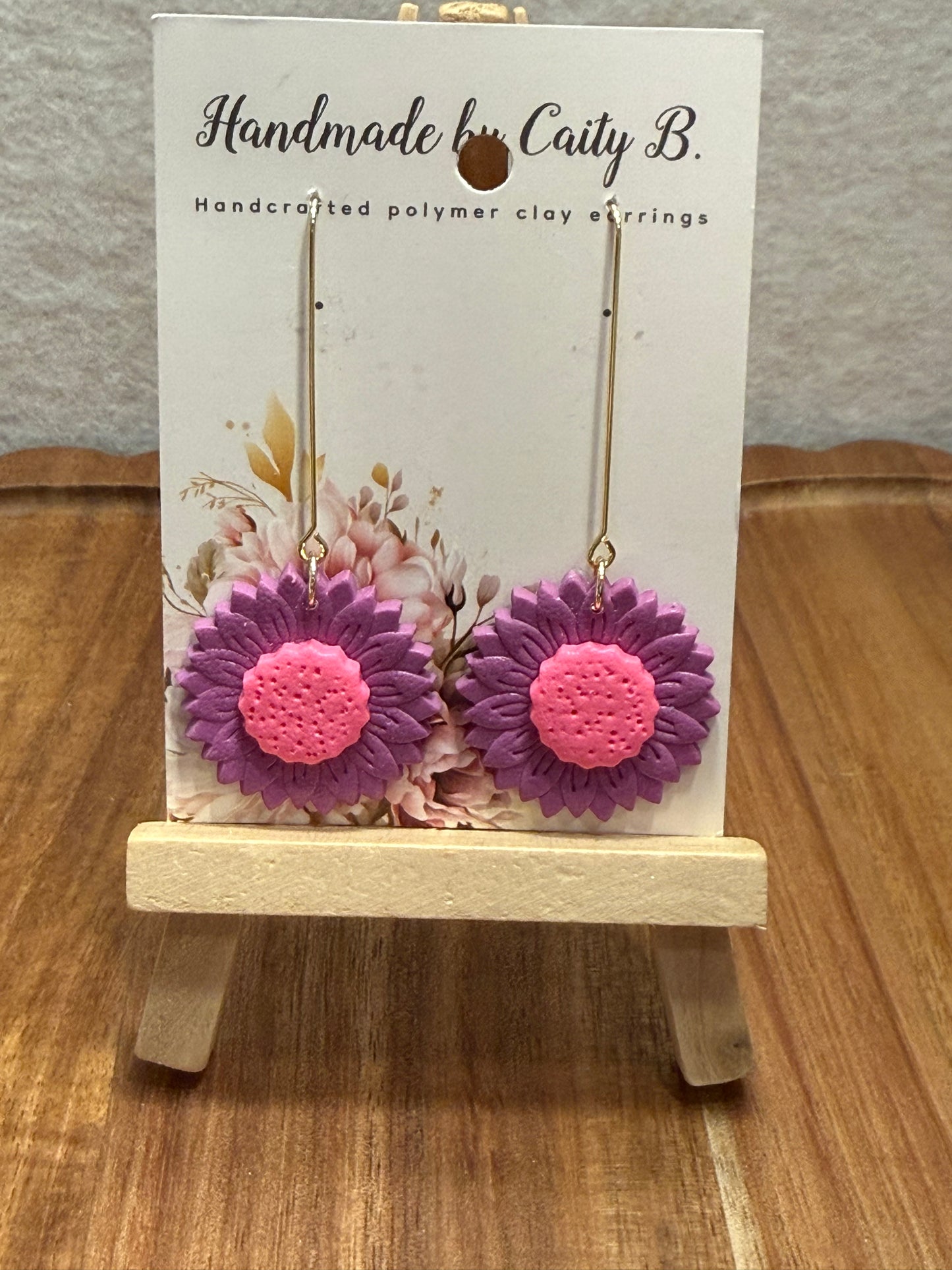 purple and pink drop daisy gold flowers