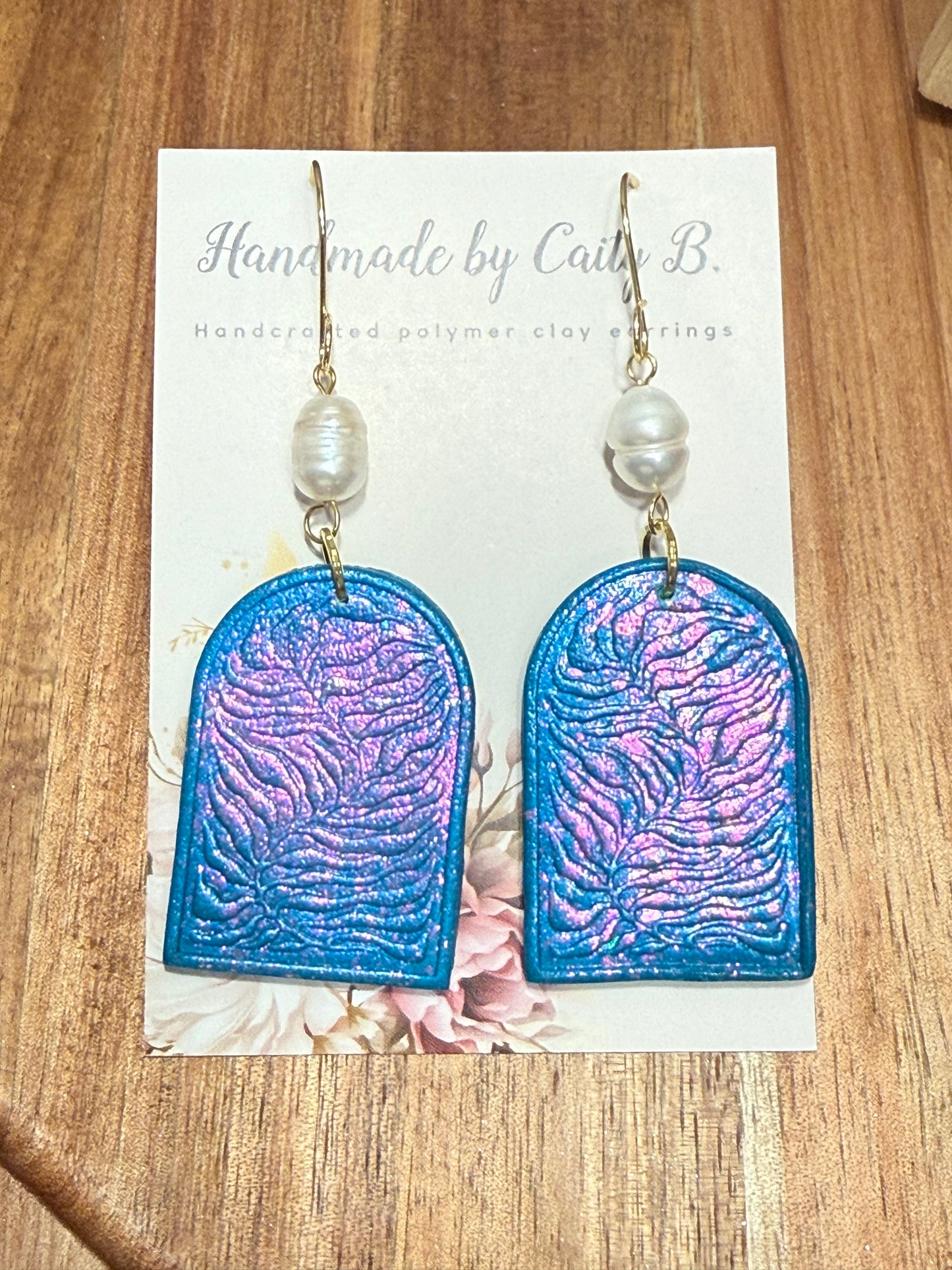 sparkle sea kelp arches with pearl charms and gold dangles