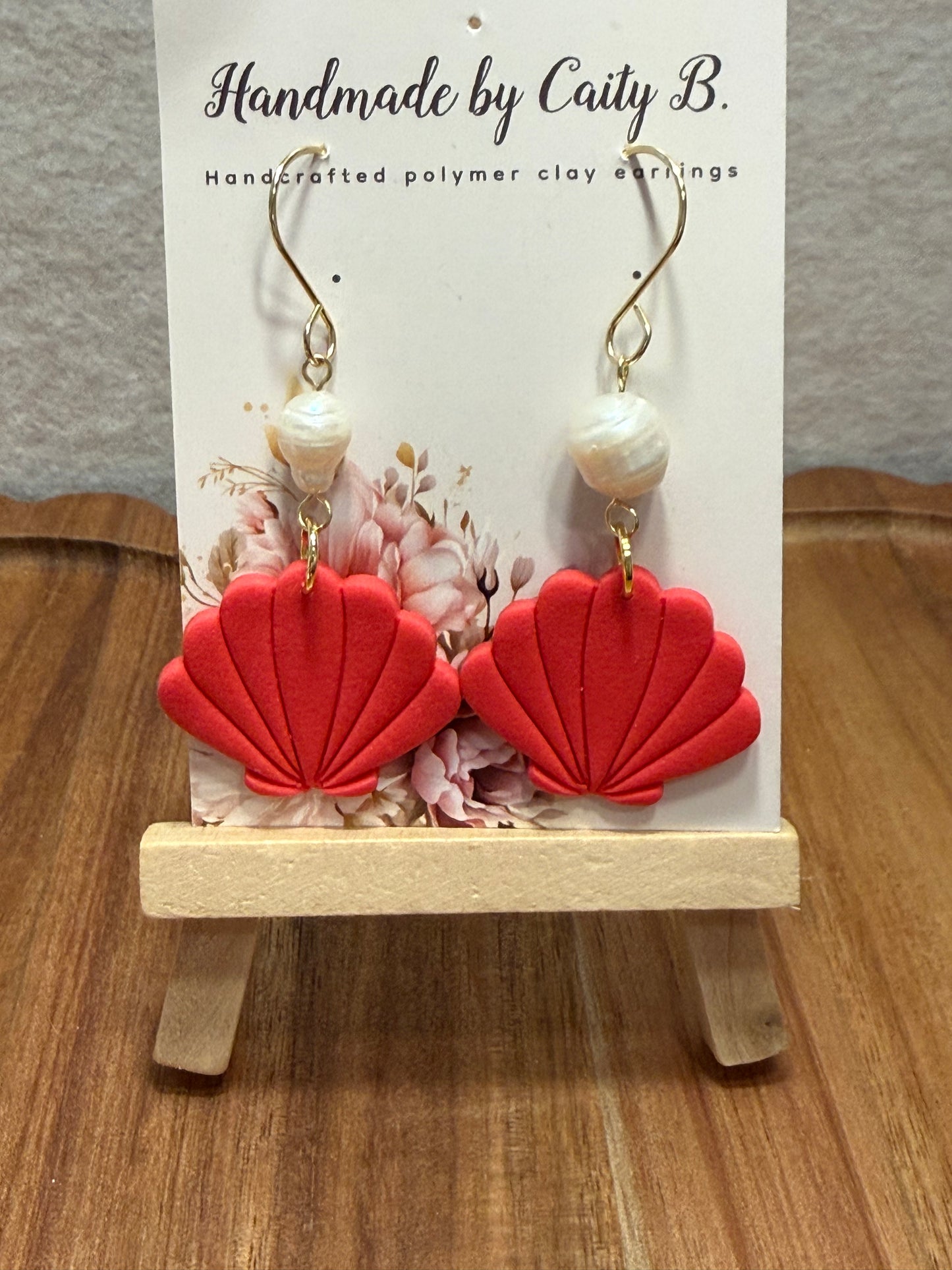 seal shell with pearl charms and gold dangles
