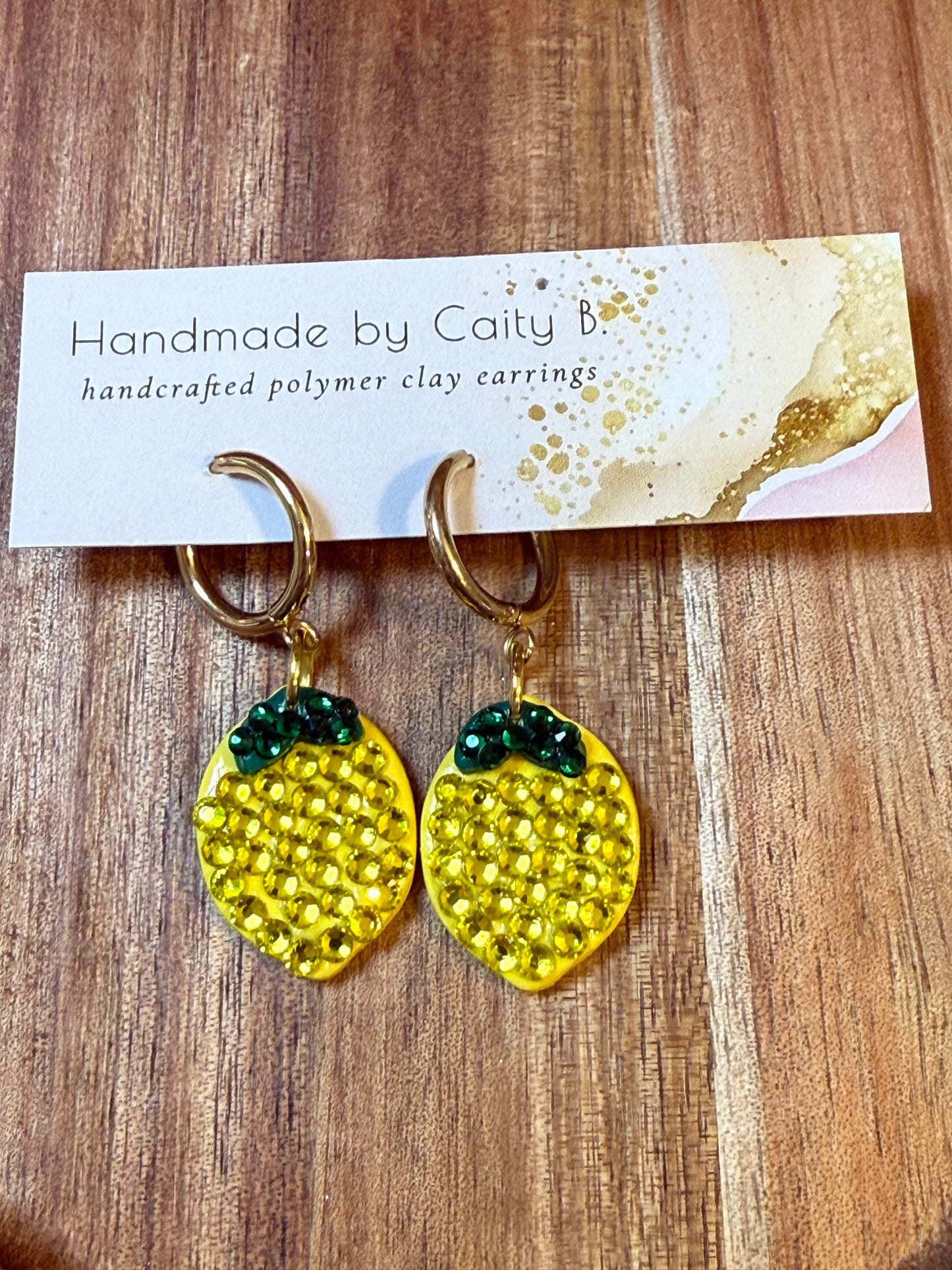 Bedazzled lemon dangle huggies