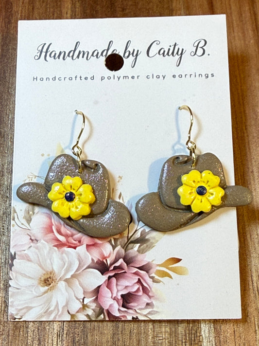 Cowboy hats with yellow flowers